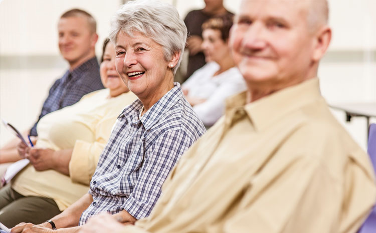 Group of people smiling and laughing